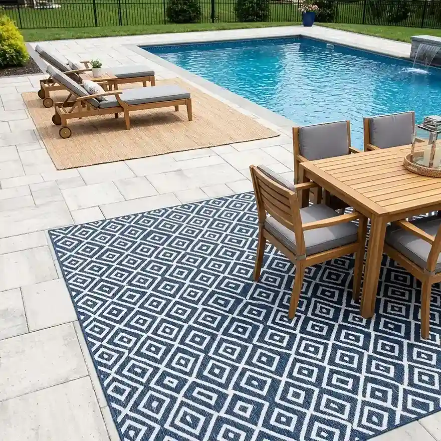 12. Use Outdoor Rugs to Define Zones and Add Color