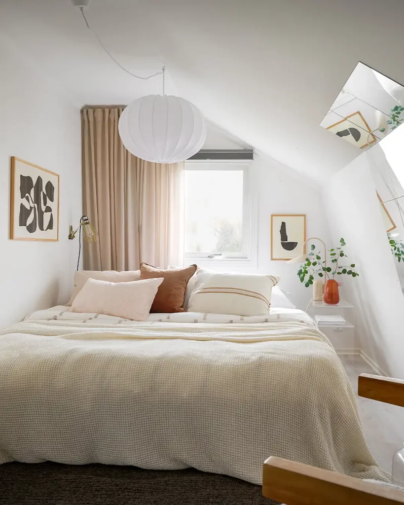 17. Use a Sloped Ceiling to Create a Cozy Teen Bedroom