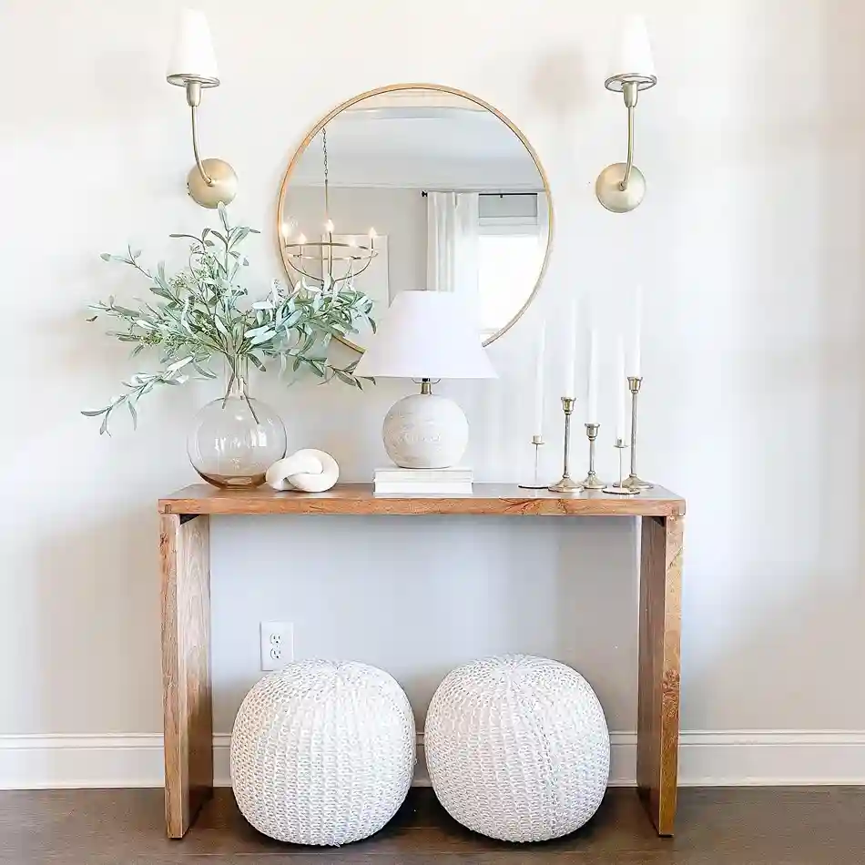 2. Install a Large Mirror to Reflect Light and Space