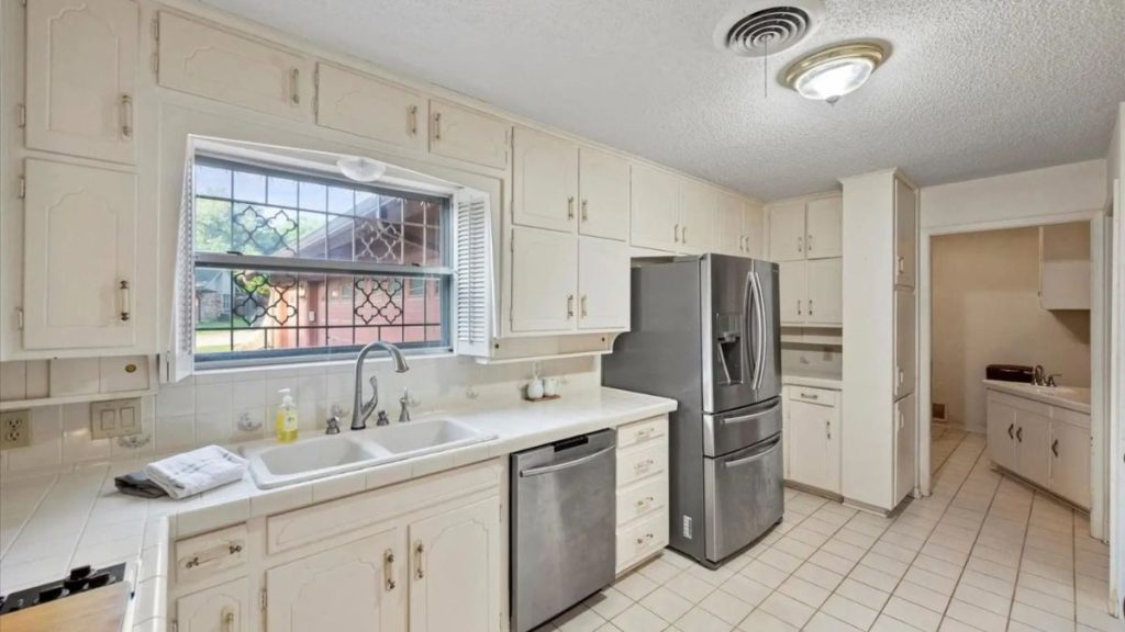 Kitchen Modern Appliances Under an Original Ceiling
